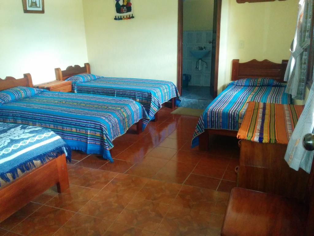 Hostal Curinan Отавало Номер фото